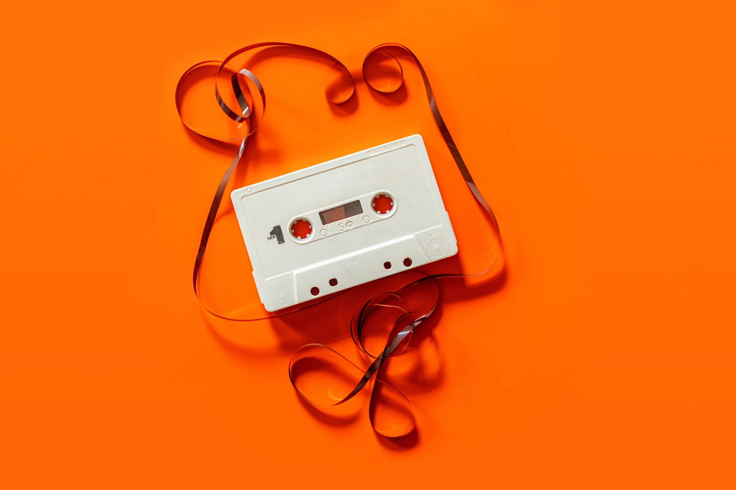 Content creation (live programmes, podcasts and interactive stories) to energise your online audience by Inner Ear. Cassette tape photo.