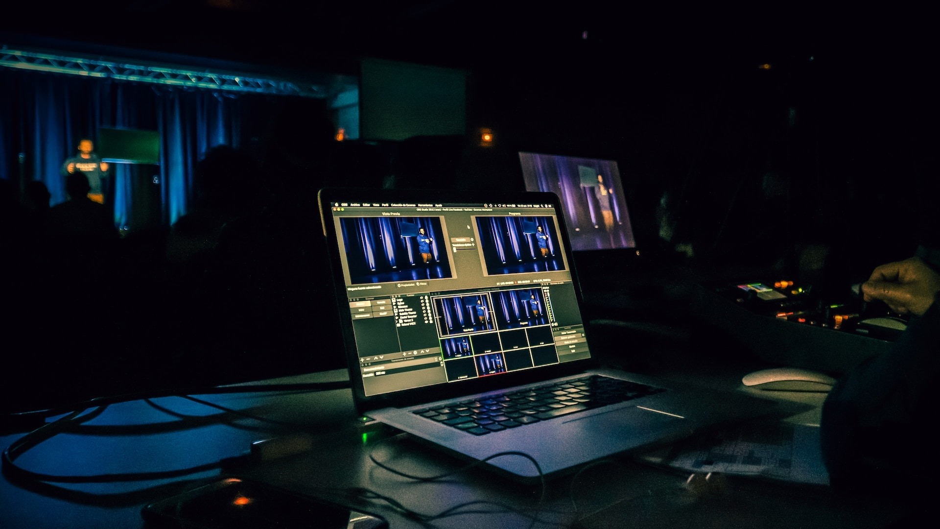 Laptop live streaming an event using OBS (Photo by Jametlene Reskp on Unsplash)